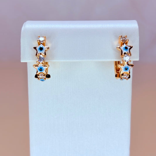 white star evil eye huggie earrings